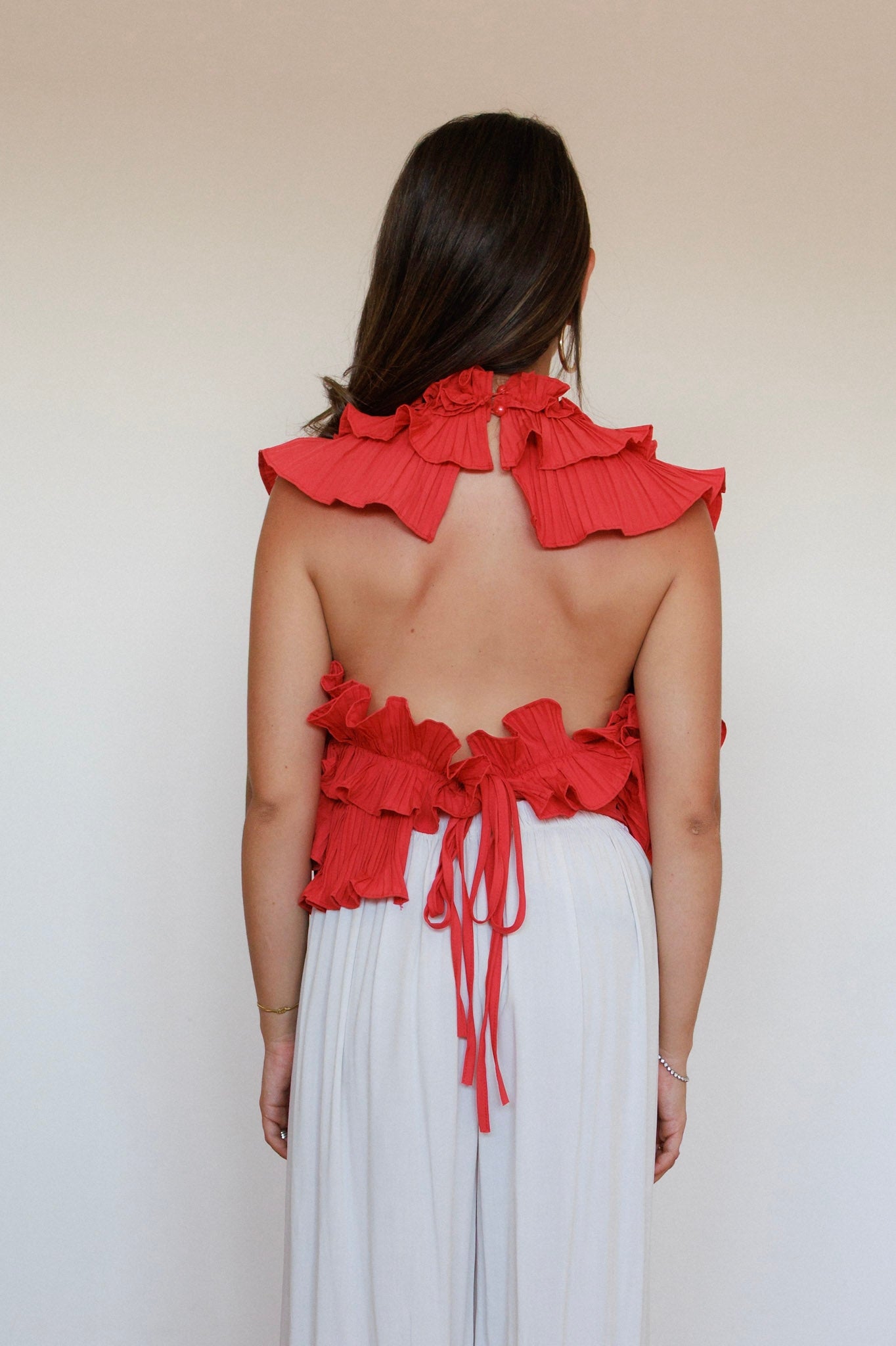 Top arricciato con schiena scoperta corallo
