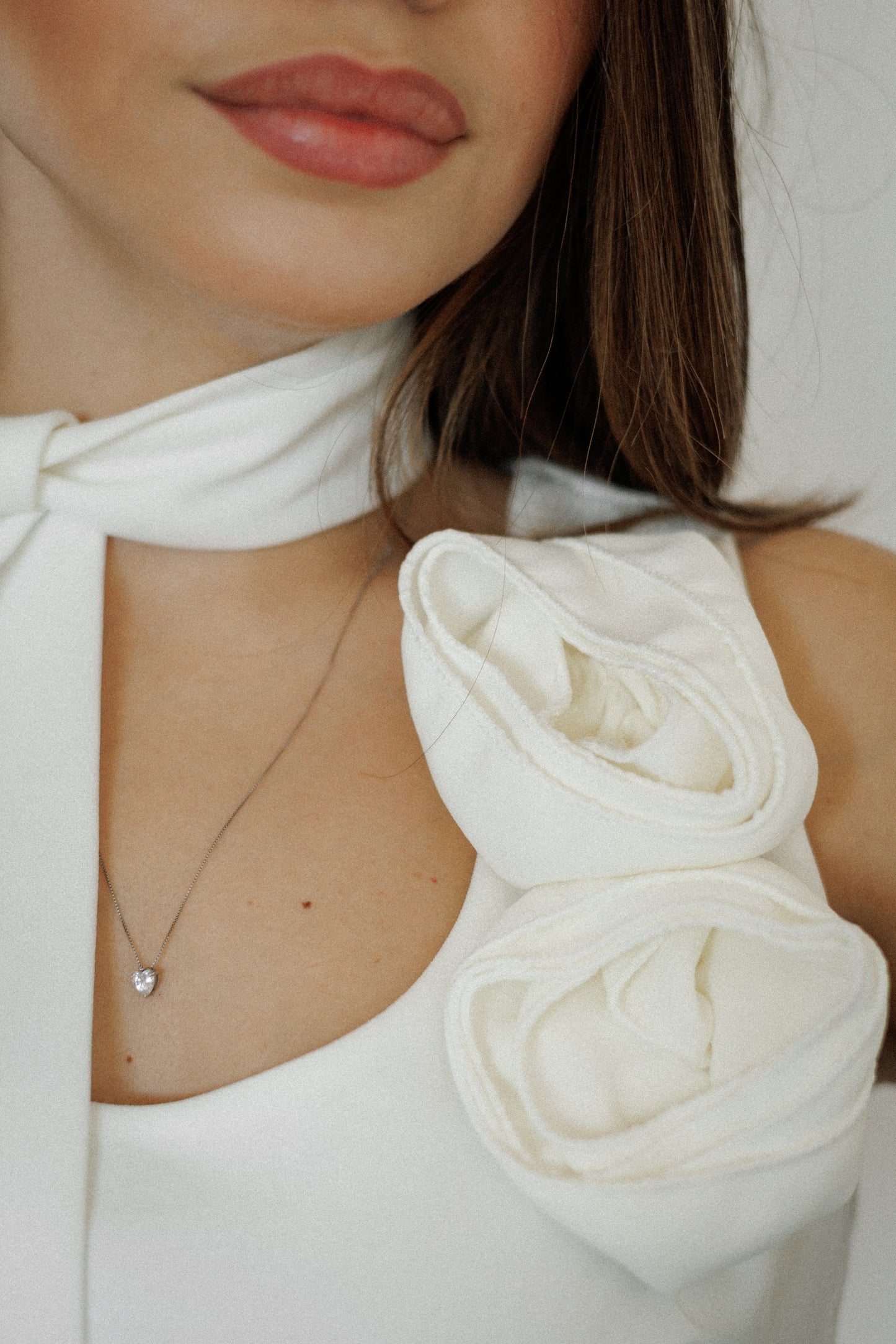 Coordinato top e pantaloni con fiori 3D