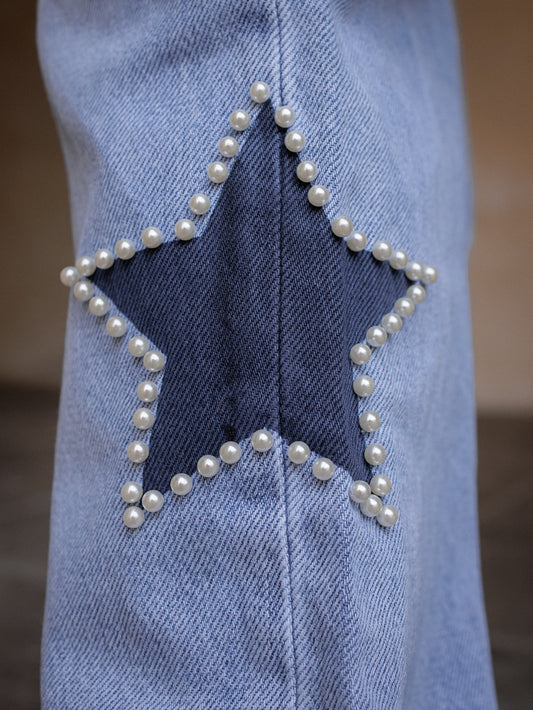 Jeans con dettaglio stella