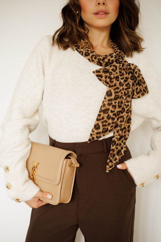 Maglione con fiocco leopardato